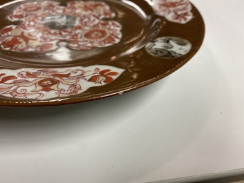 Six Chinese iron red and grisaille capucin brown-ground plates, Qianlong